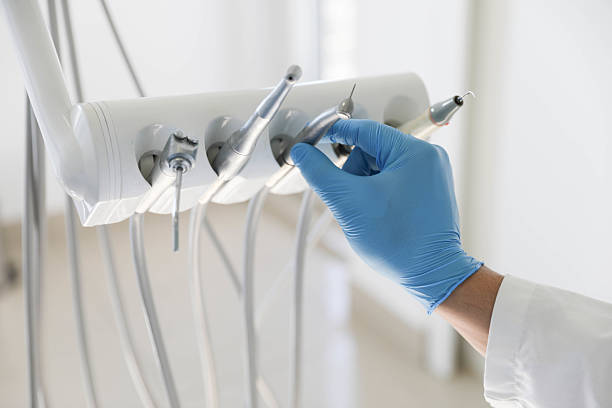Professional Tooth Extraction technician working in Marion, KS